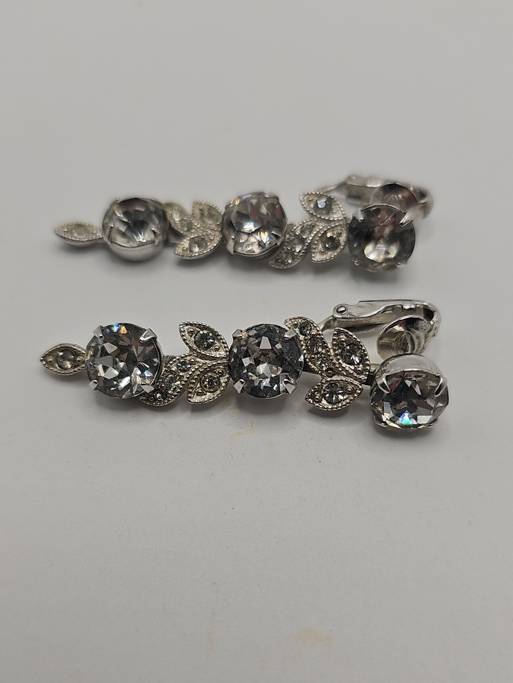 Eisenberg Elegant Silver-Tone Clear Crystal Leaf Drop Earrings. Signed.